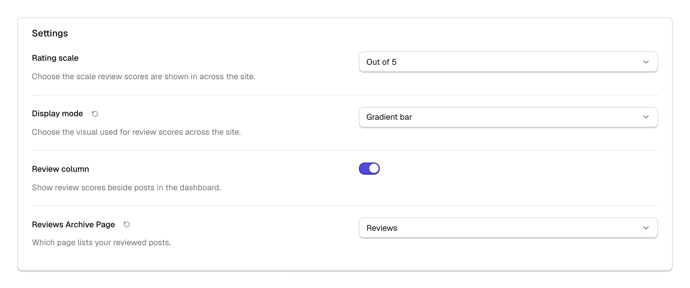 The Settings group on the Reviews page in Theme Options: Rating scale set to Out of 5, Display mode set to Gradient bar, the Review column switch turned on, and a Reviews Archive Page chosen.